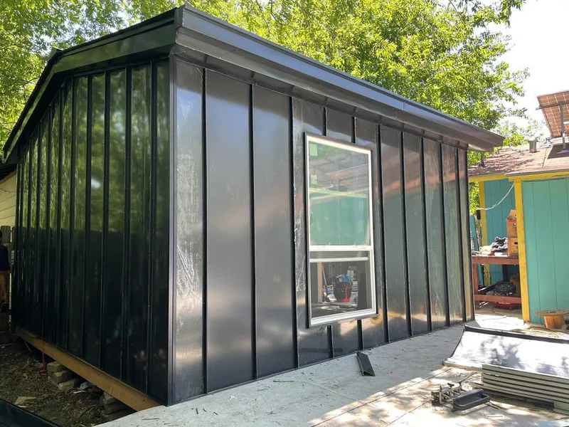 Black standing seam metal wall panels for Roof Inspection in Rochester Hills