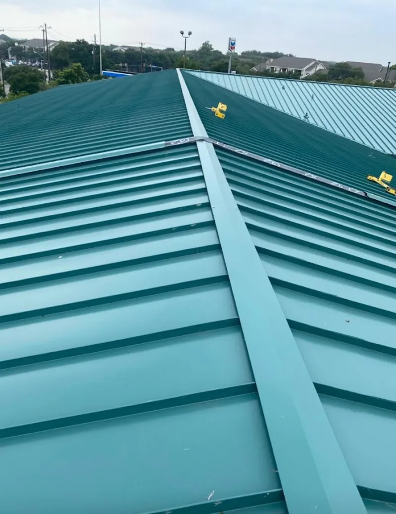 Green commercial metal roof ridge and valley for Metal Roof Repair in Rochester Hills